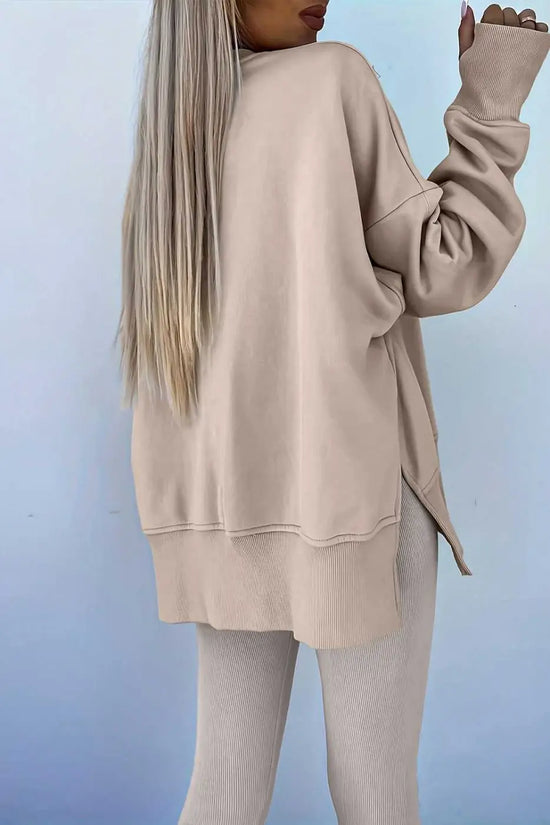 Back view of beige Oversized Sweatshirt and Leggings Matching Set, emphasizing the oversized silhouette and ribbed knit leggings.